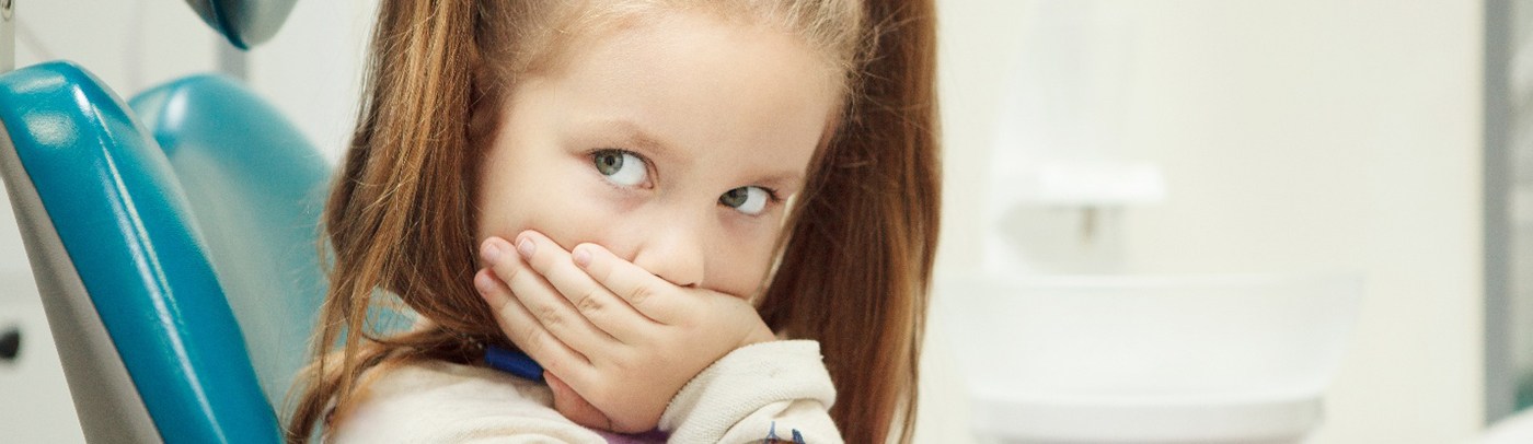 A little girl with a toothache