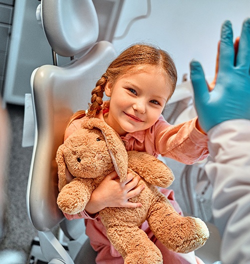 A little boy getting pulp therapy at the dentist
